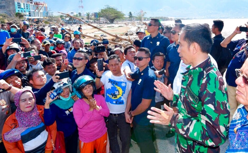 Indonesian President Joko Widodo visited the region on Sunday afternoon and urged a "day and night" effort to save those who can be saved. He also authorised the opening of doors to dozens of international aid agencies and NGOs lined up to provide live-saving assistance. AP Indonesian President Joko Widodo visited the region on Sunday afternoon and urged a "day and night" effort to save those who can be saved. He also authorised the opening of doors to dozens of international aid agencies and NGOs lined up to provide live-saving assistance. AP